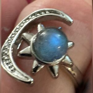NWT moon and star adjustable ring with color changing stone.